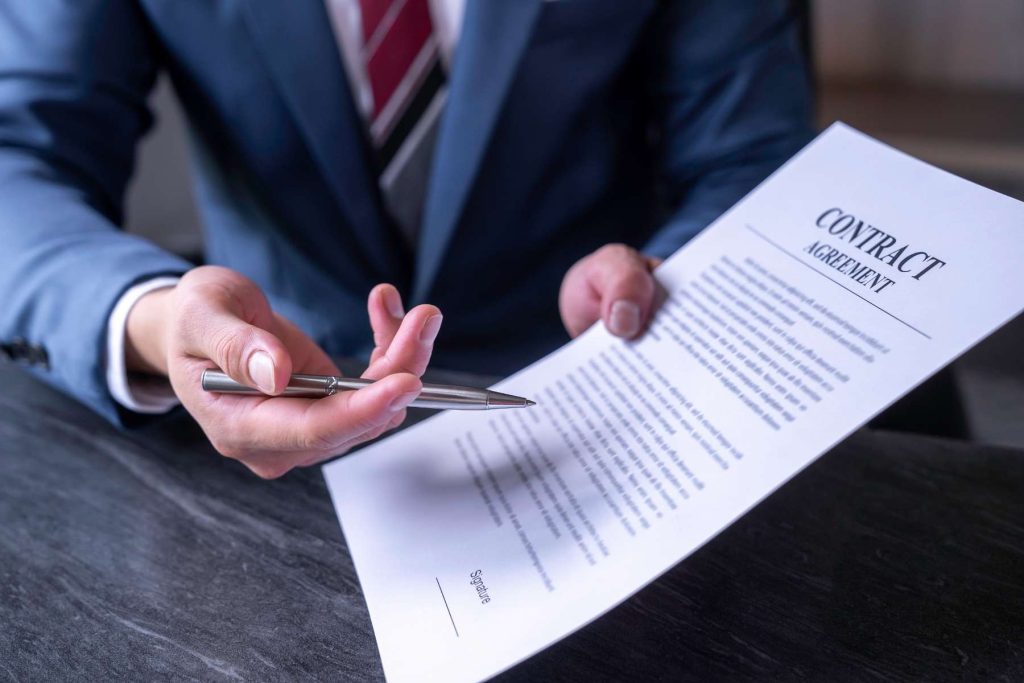 Employment contract being reviewed by a legal adviser