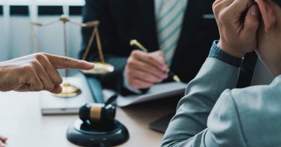 Employee discussing a workplace complaint with a legal adviser